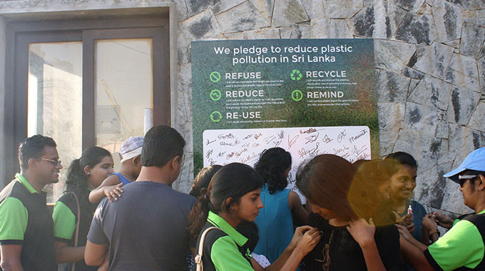Green “Plasticcycle” Ribbon Campaign At Crow Island Beach Park